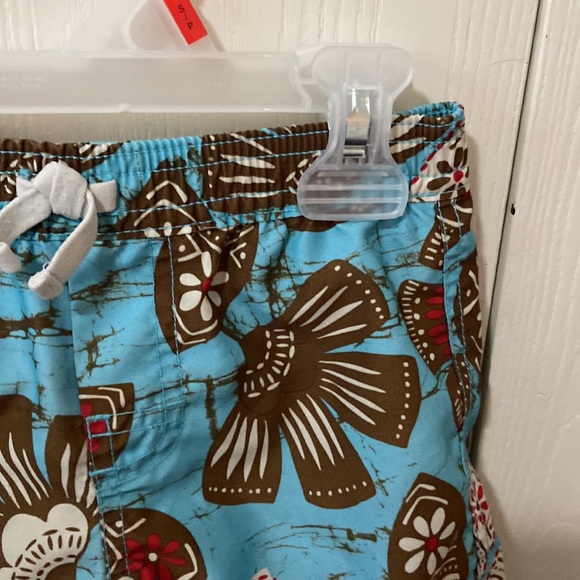 Baby GAP Sky Blue Swim Trunks with Brown, Cream & Red Tropical Flowers - Picture 3 of 7
